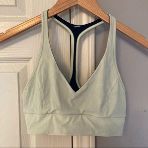 Lululemon yellow and black sports bra.